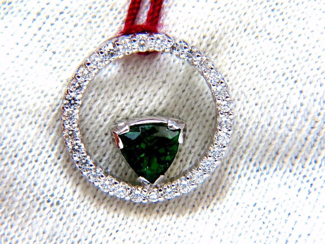 1.55ct Natural Tsavorite diamonds circle pendant 14kt **: Title: 1.55ct Natural Tsavorite diamonds circle pendant 14kt ** Description: Circular Halo Deco 1.05ct. Natural Green Tsavorite Garnet Pendant. Trilliant cut Brilliant 5.4mm Clean Clarity & Transparen