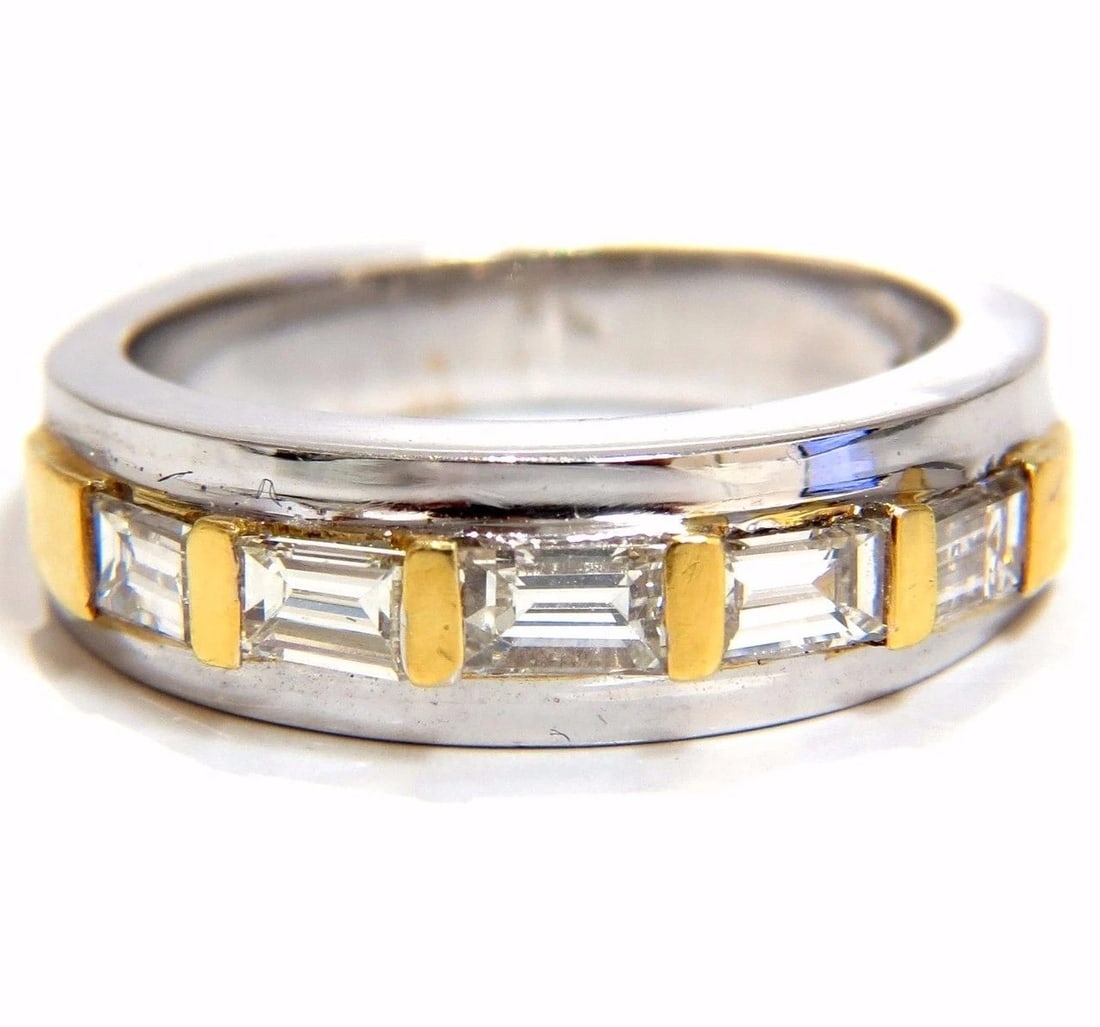 .86ct (5) natural baguette diamonds band 18kt g/vs +: Title: .86ct (5) natural baguette diamonds band 18kt g/vs + Description: .86ct. Diamonds baguette band G color Vs-2 clarity Channel Set 9.2 grams Size 6.5 (we may resize, please inquire) Band: 5.9mm w