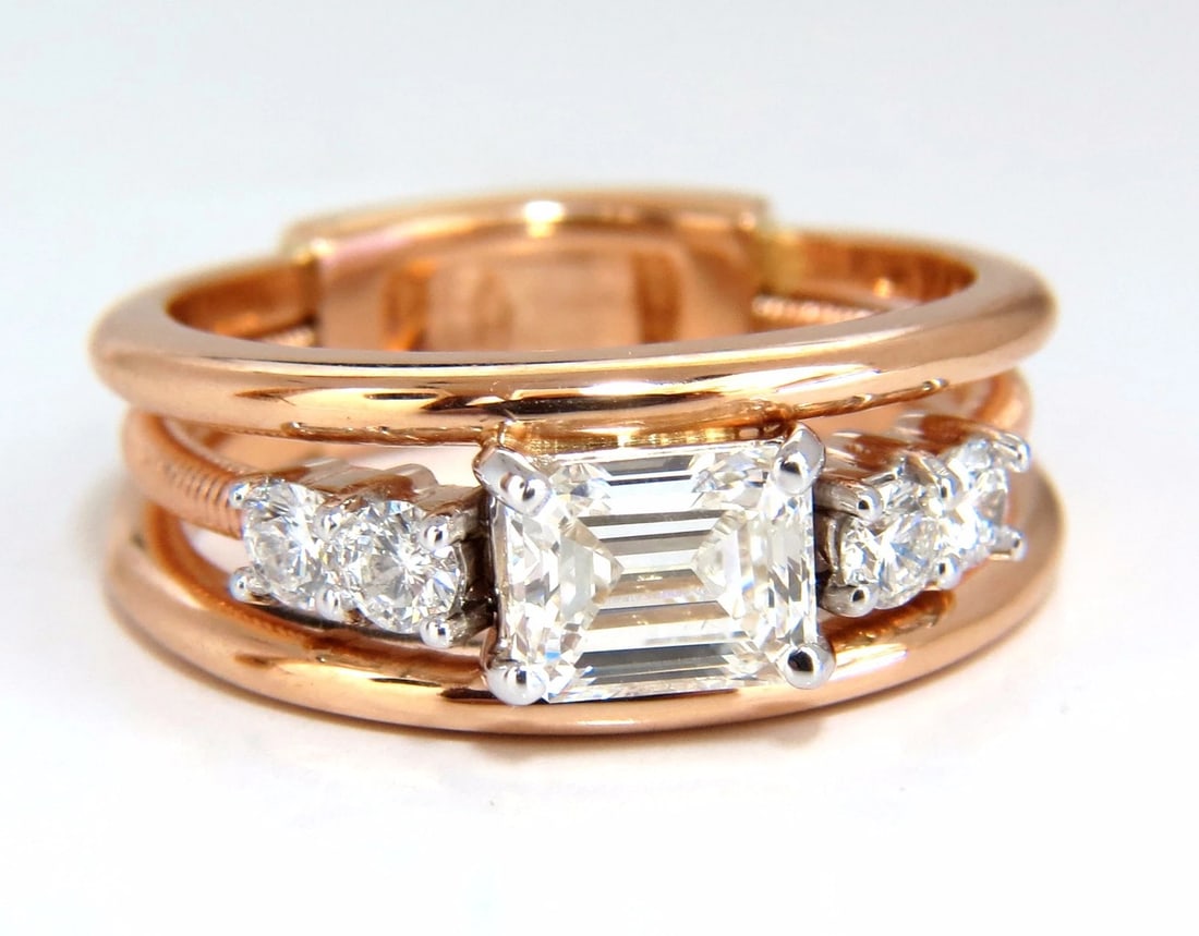 GIA Certified 1.46ct Emerald Cut Diamonds ring 18kt F/VVs-1 Coil A+: Title: GIA Certified 1.46ct Emerald Cut Diamonds ring 18kt F/VVs-1 Coil A+ Description: MAGNIFICENT JEWELS Coil Wrap Mod Deco GIA 1.06ct. Emerald cut diamond Ring F color VVs-1 clarity 6.50 x 5.18 x 3