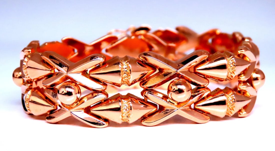 Retro Cosmopolitan Wide Cuff Bracelet 14kt Gold 12451**: Title: Retro Cosmopolitan Wide Cuff Bracelet 14kt Gold 12451** Description: New with packaging PRODUCT DESCRIPTION Rare Cosmopolitan Retro Link Bracelet 16mm wide 18kt Gold 27.9 grams Reserve: $6,79