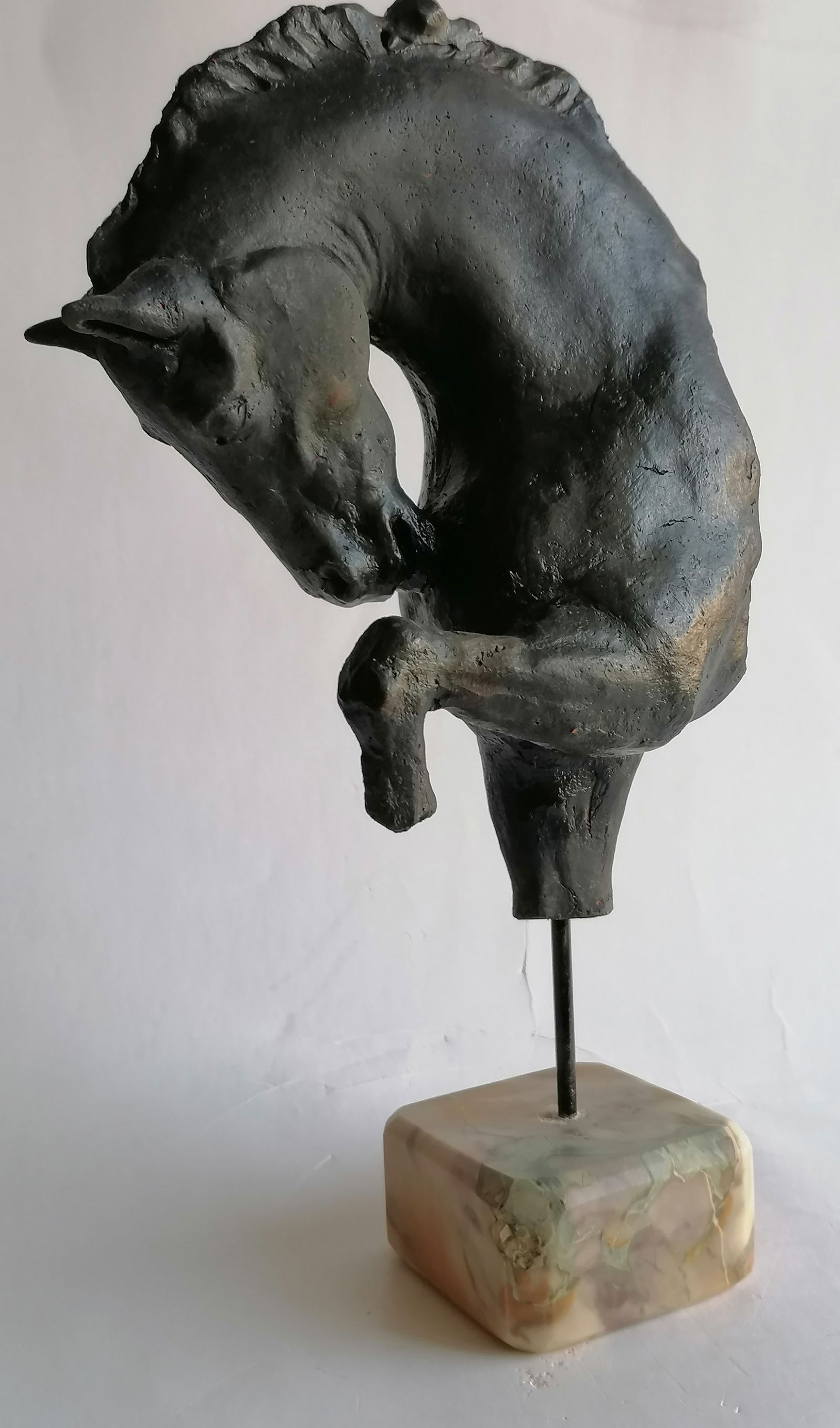 Ceramic Horse: Title: Ceramic HorseDescription:Painted red ceramic sculpture depicting a fragment of a horse placed on a fine colored marble base (Breche du Bearn). Height including base: 31 cm.Date/Period: xx