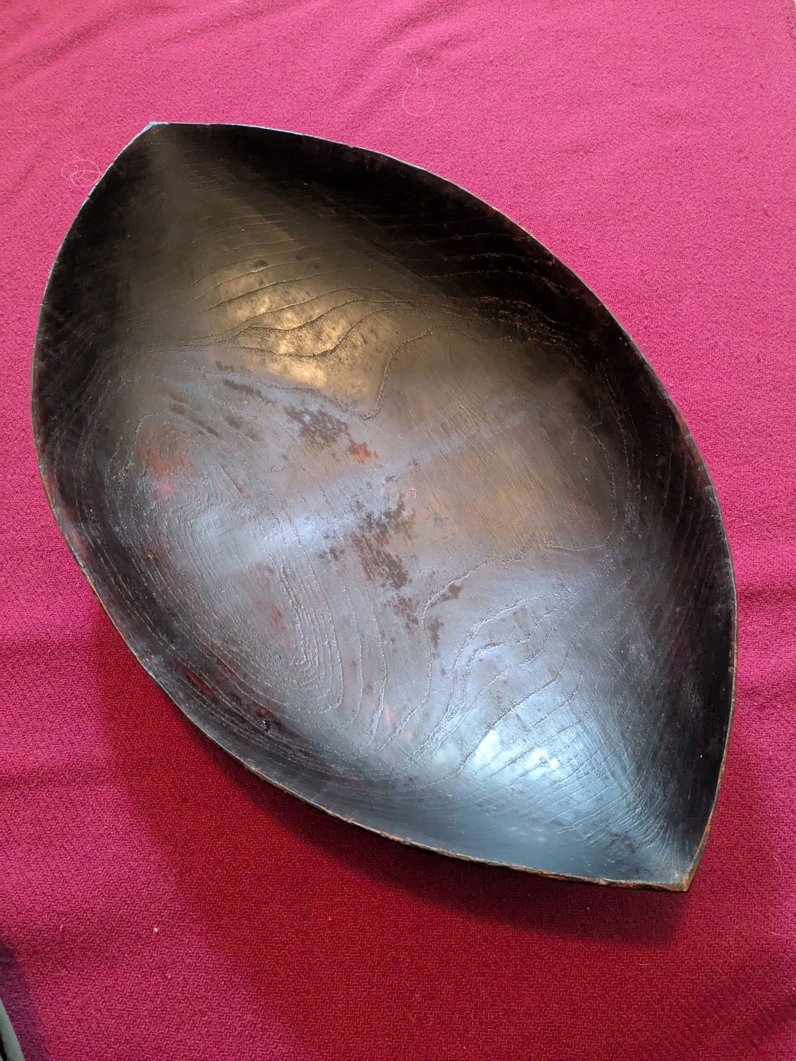 Feasting Bowl: Title: Feasting BowlDescription:Lake Sentani carved wooden food dish used during in communal feasts, from Papua Province Indonesia. Intricately carved insect like creatures with a sea turtle head. 