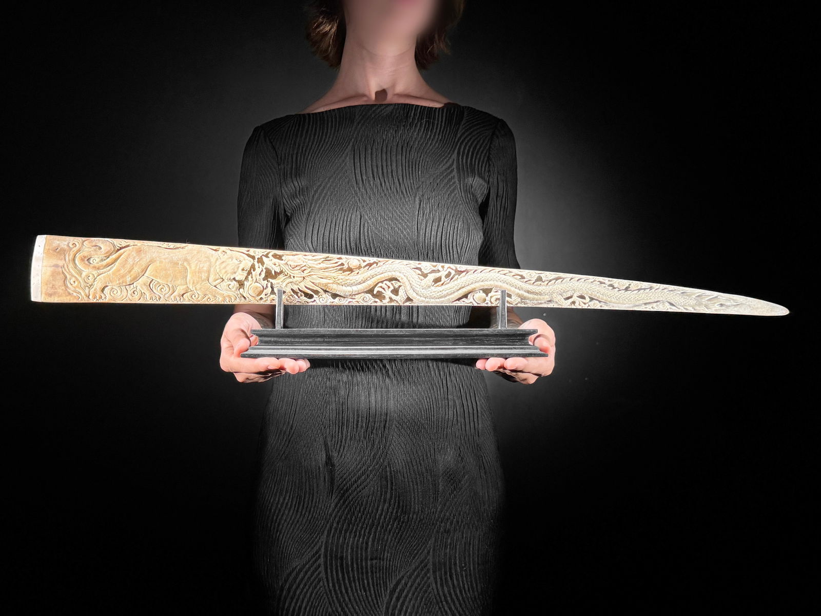 A large carved swordfish rostrum - Tiger dragon carving: Title: A large carved swordfish rostrum - Tiger dragon carving Maker:Unknown Origin: Indonesia Date/Period:2025 Materials:Xiphias Gladius, Bone, wood Dimensions:Length: 80 cm / 31.4 inches Description