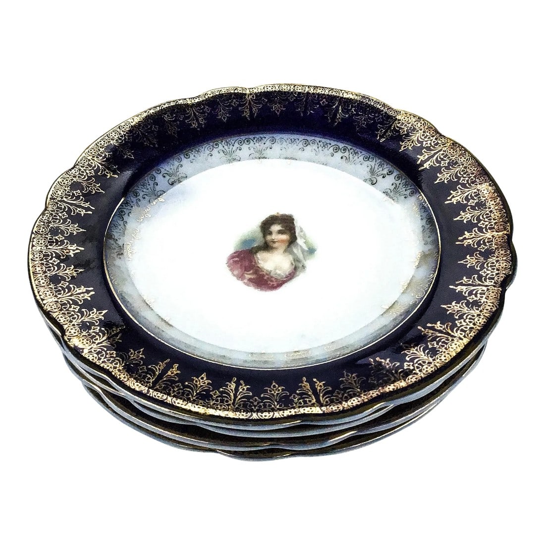 Rare Antique Carlsbad Austrian Plate Set Victorian Ladies Set of 4: Set of 4 small plates hand painted with gold leaf over cobalt and white porcelain. No chips and in perfect condition with the exception of some gold overlay rubbed off in various places as shown. Ther
