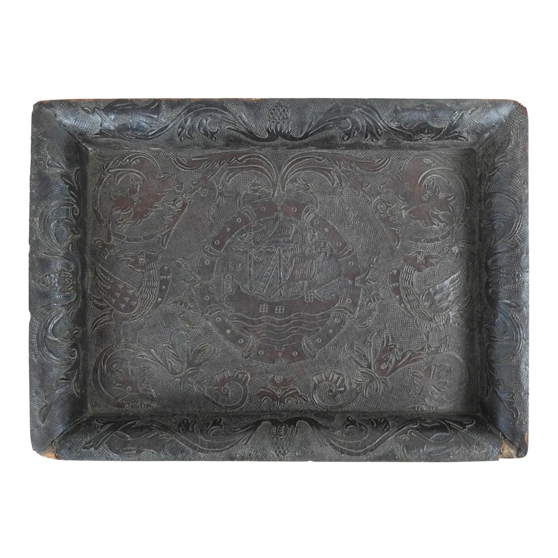 Antique 19th Century Hand Tooled Leather and Wood Tray: Antique possibly 19th century tooled leather over wood tray. Highly detailed with sailing ship, creatures, birds, dragons. Likely had handles at one time, now gone, bottome has been renailed over the
