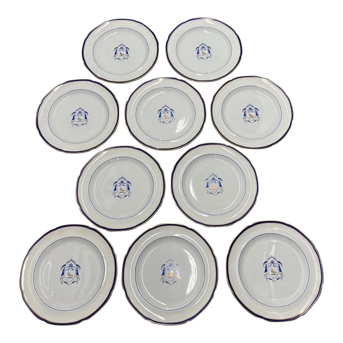 Set of 10, Antique Copeland Spode Armorial Dinner Plates C. 1950: A semi-antique set of 10 Copeland Spode New Stone (made 1920-1960) dinner plates having a navy a armorial central medallion adorned with a bird of prey and a navy and gold leaf around the periphery. M