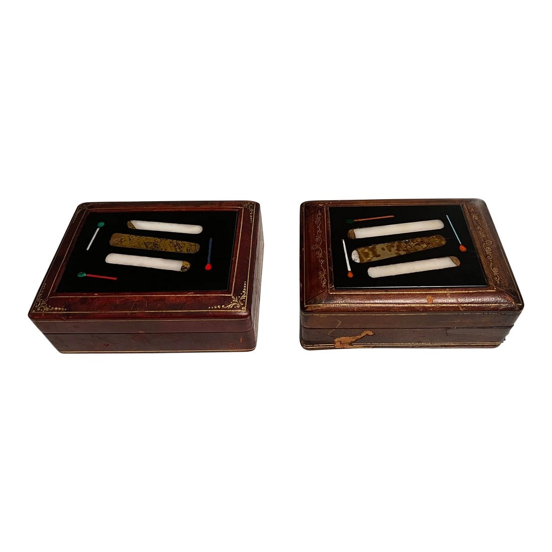 Pair, Italian Tooled Leather & Pietra Dura "Cigar" Motif Tobacco Boxes: Italian, early to mid 20th century. A pair of leather boxes, each having tooled gilt leather to the border of a finely inlaid Pietra Dura top. The tops set with various semi-precious stones including