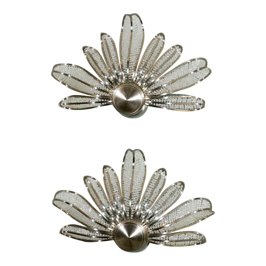Pair of Mid 20th Century Modern Style Fanned Sconces, Wired: A pair of vintage sconces with an art deco design in an upward fanning motif with clear beaded accents within a sparkly silver armature. This pair of sconces have been rewired for the US. Condition: A
