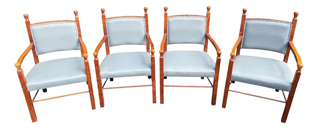 Late 20th Century Rustic Style Carved Wood and Blue Faux Leather Dining Chairs - a Set of 4: Quick Hits: Late 20th century carved wood dining chairs – set of 4 Rustic style with blue faux leather upholstery Heavily carved oak-like frames with subtle Western flair Comfortable curved back