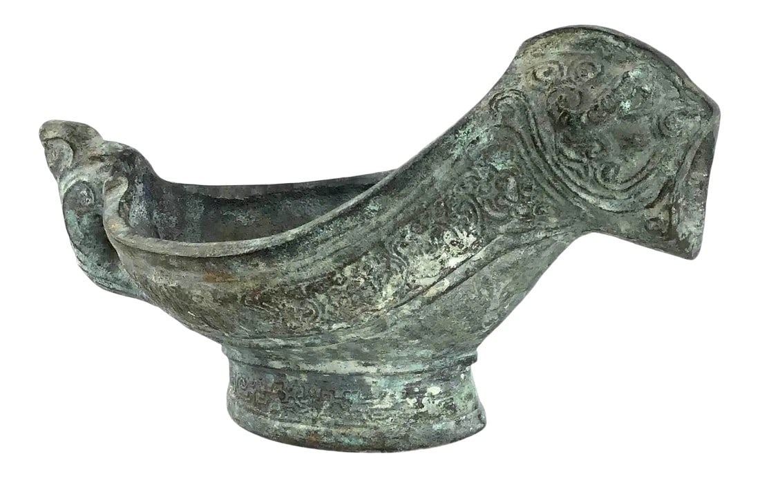 Chinese Antique Bronze Vessel: Unique design and shape on this Chinese Symbolic vessel. Probably made during the Republic Dynasty. This piece will turn heads while on display in your home or office. Heavy and in wonderful