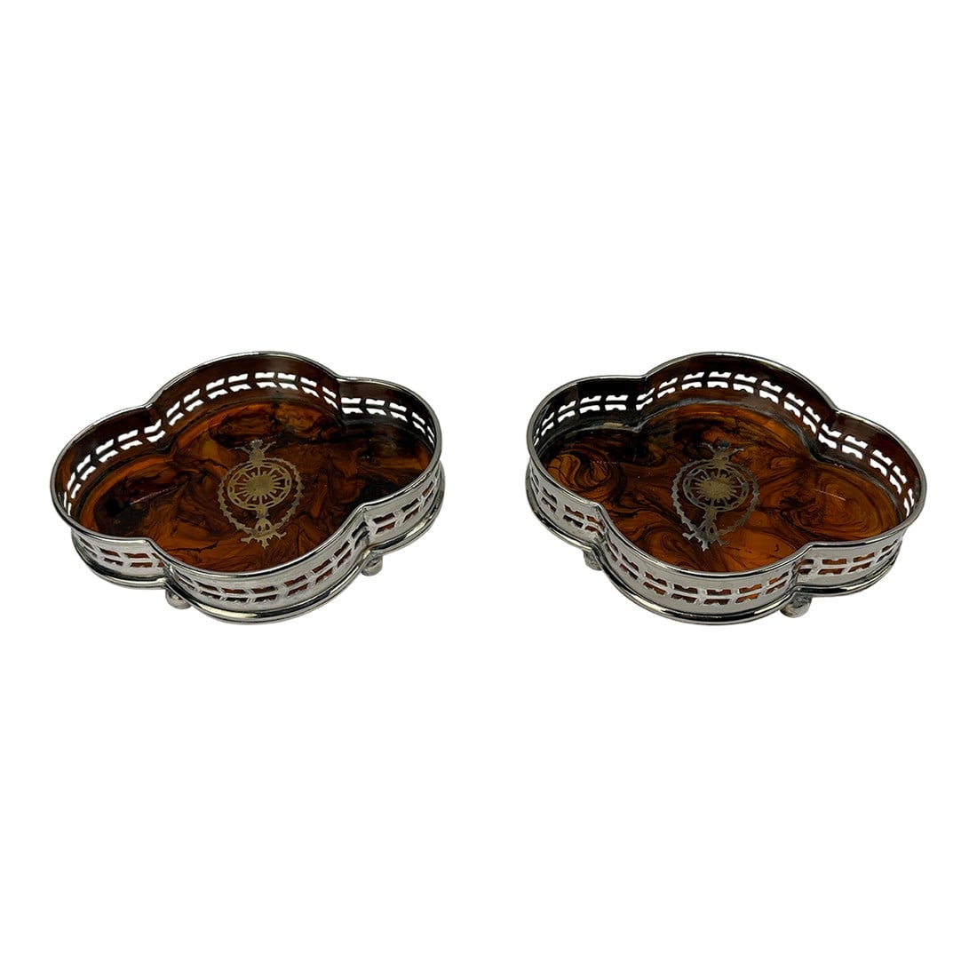Pair, English Faux Tortoiseshell & Silverplate Gallery Edge Wine Coaster: This elegant pair of vintage wine coasters exemplifies the refined craftsmanship and sophisticated design typical of early to mid-20th-century decorative tableware. Fashioned from gleaming