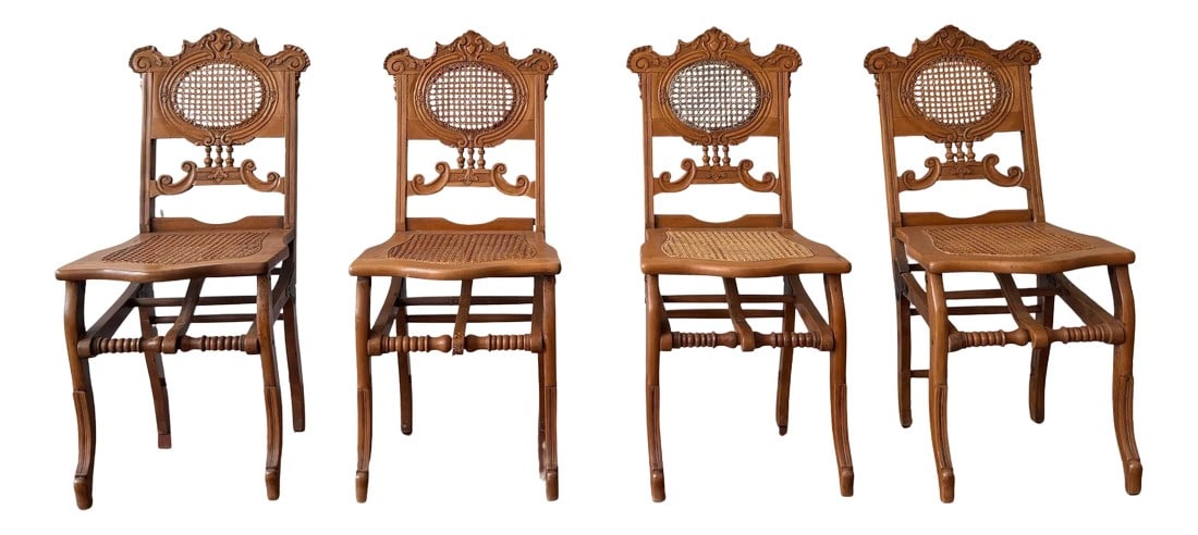 Late 19th Century French Renaissance Revival Cane Folding Chairs in Oak - Set of Four: Set of four French Renaissance Revival folding chairs in Oak Circa 1890. Hand caned seats and oval panels on backs are in excellent condition. Each chair is hand carved and all have slight variations