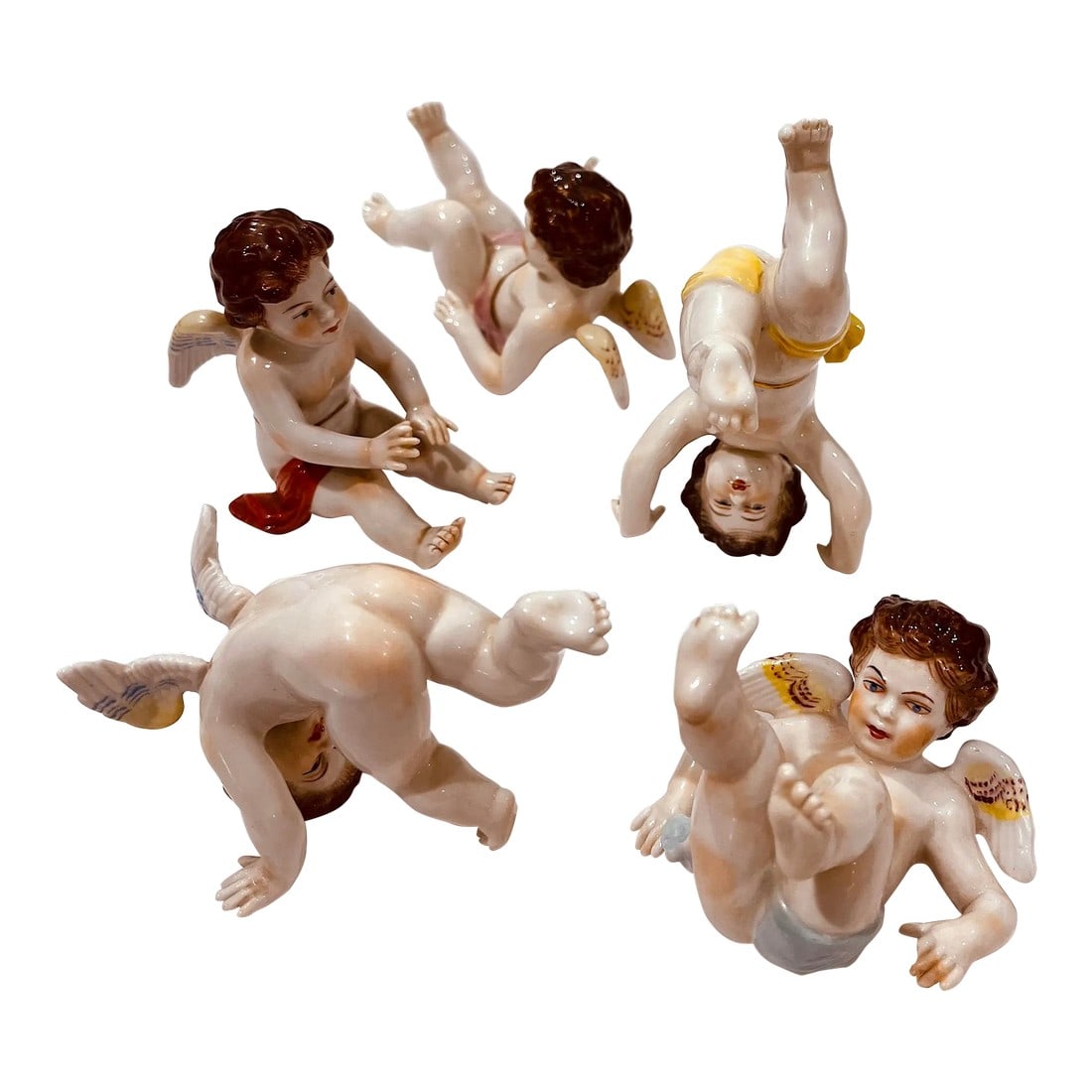 19th Century Italian Porcelain Tumbling Putti Figurines - Set of 5: This charming set of five "tumbling" putti (cherubs) was created in the Capo di Monte factory in Naples, Italy sometime in the 19th century. Deftly crafted in porcelain- each piece is finely hand pain