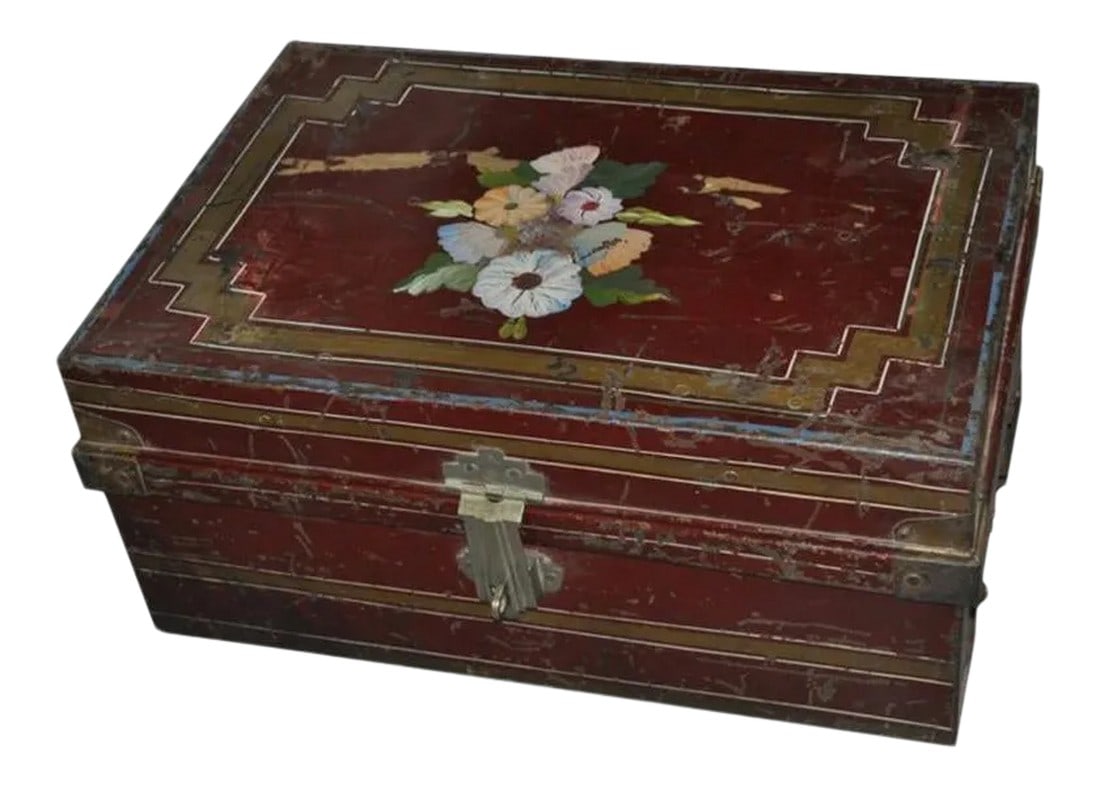 Antique Metal Manuscript Trunk Box: Dimensions: 23.5"³ W x 16"³ D x 11"³ H This antique box was used to store old religious manuscripts in temples in India. It has the original red painted background with and floral patte
