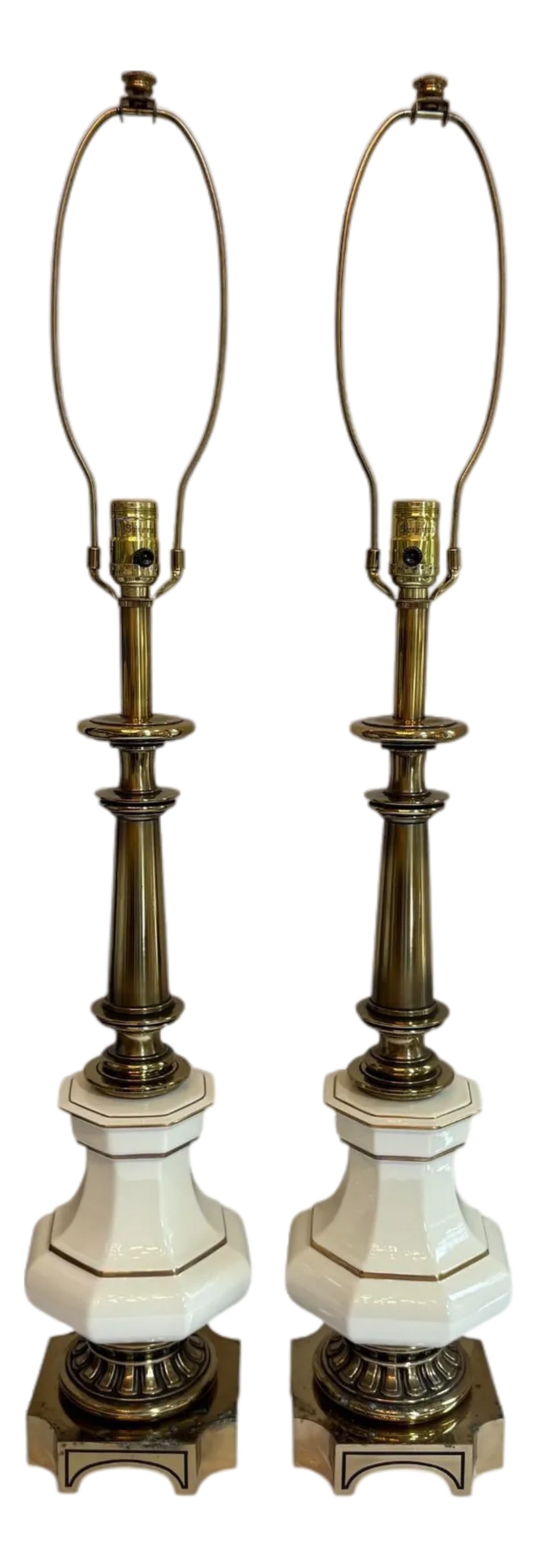 Mid 20th Century Stiffel Brass and White Porcelain Lamp - A Pair: Stiffel Brass & White Porcelain Lamps - a Pair These two lamps are tall with brass columns and a white porcelain base. The porcelain base has brass tone paint accents and octagonal bases. The Stiffel