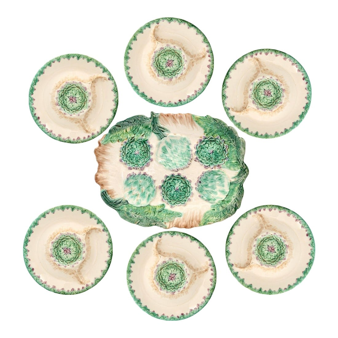 French Longchamp Terre De Fer Artichoke Service W/ Rare Platter: A rare and complete French majolica service by Longchamp, including a hard-to-find large platter and six matching plates, each molded with artichoke centers, scalloped rims, and vivid green-and-cream