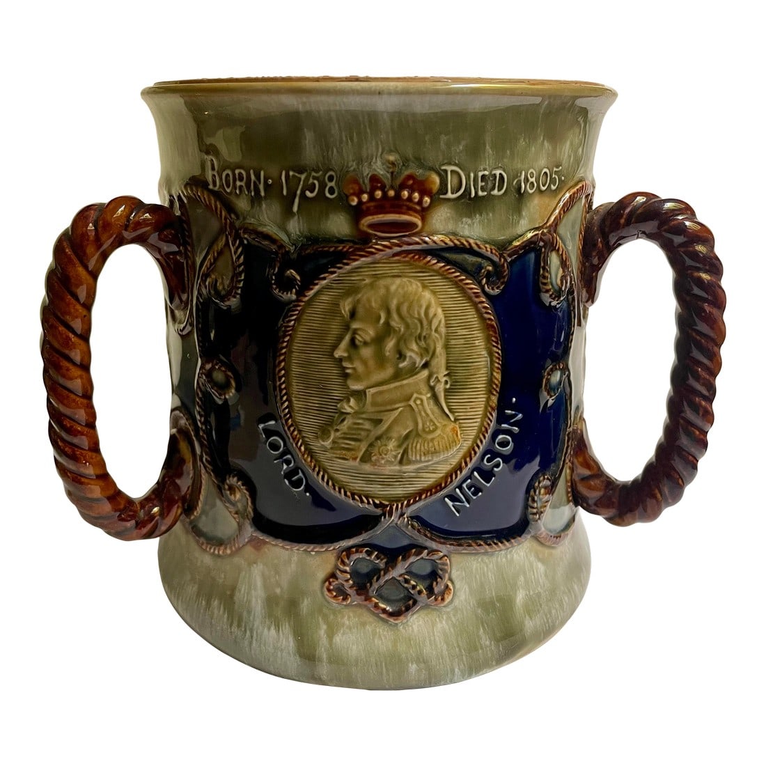 Early 20th Century Royal Doulton Lord Nelson Memorial Large Stoneware Loving Cup Centerpiece: This is a fine quality and wonderfully decorative large loving cup made by Royal Doulton to commemorate the memory of Lord Horatio Nelson who was credited with aiding England in it's victory over Napo