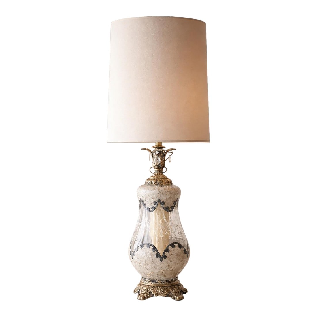 Stately 1950s Hollywood Regency Gilt & Hand-Decorated Glass Table Lamp "” Elaine R. Estate: A stately and elegant Hollywood Regency table lamp dating to the 1950s, featuring a hand-decorated glass body with classical scroll and foliate motifs, mounted on an ornate gilt metal base with sculpt