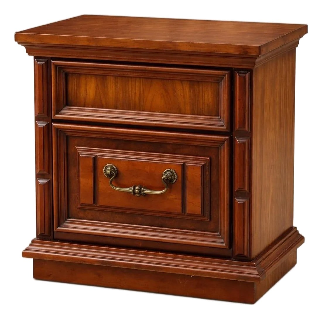 1970s Traditional Revival Nightstand in the Manner of Drexel – Warm Brown Mahogany Finish: A beautifully preserved 1970s traditional revival nightstand in a rich brown mahogany finish, featuring fluted corner detailing, recessed panels, and classic brass hardware. Part of a coordinating sui