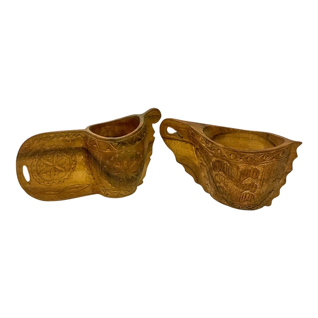 Hand Wood Carved Vintage Ritual Cups - A Pair: An Antique Scandinavian folk art wooden jug, commonly referred to as a 'Nordic wedding cup', hand carved with wheels, hearts and circles. Made in the former Yugoslavia. They are absolutely lovely and