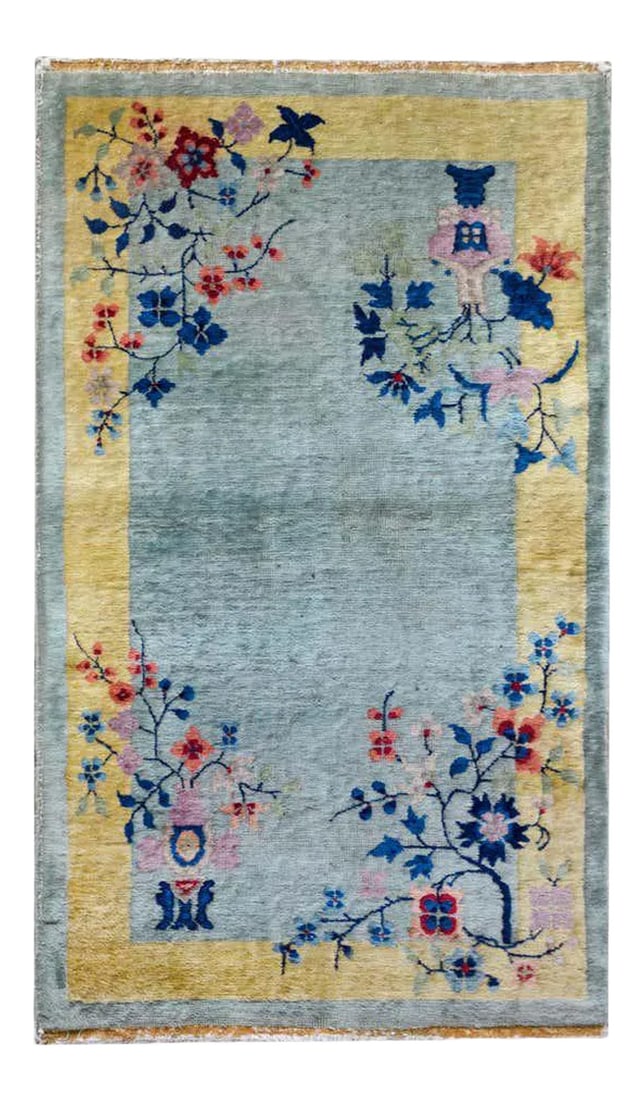 Early 20th Century Chinese Art Deco Rug: A charming early 20th century Chinese Art Deco rug with a sweet colors palette with a mint green field surrounded by a wide gold border, and all overlaid with myriad flowers including peonies, chrysan
