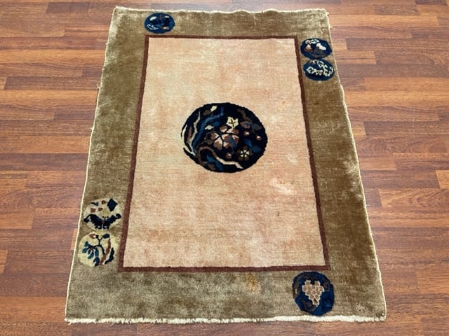 Antique Pekking Chiness Rug-FA: Title:Antique Pekking Chiness Rug-FADescription:An antique Chiness Pekking rug from China, size 3 ft.x 3.10, circa 1910, very good condition with slight lower pile, complete rug with all original