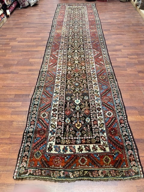 Antique Persaian Long Kurdish Runner-2586: Title:Antique Persaian Long Kurdish Runner-2586 Description:An all over antique long Kurdish runner from northwest Persia, size 3 ft. 6 inches by 15 ft, circa 1920, all over floral design on brown fie