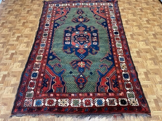 Vintage Afghan Caucasian Rug: Title:Vintage Afghan Caucasian RugDescription:Beautiful caucasian rug made in Afghanistan, size 4 ft by 6 ft. 3 inches, circa 1990, excelent condition with a good pile throughout, complete rug with