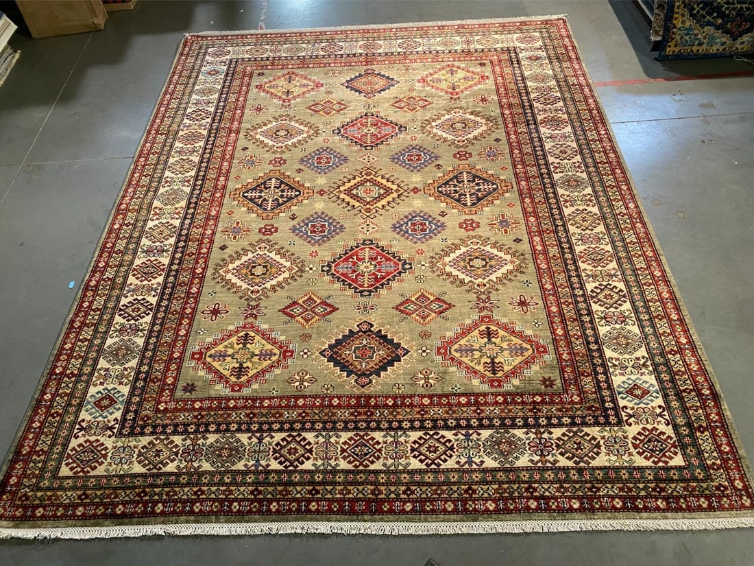 EXQUISITE FINE SUPER KAZAK RUG 8'.3"x10'.2": Title:EXQUISITE FINE SUPER KAZAK RUG 8'.3"x10'.2"Description:8'.3"x10'.2" Super quality Unique Kazak Rug, hand spun and hand knotted rug in Pakistan 100% Vegge Dye natural wool with Sheen Pile , in