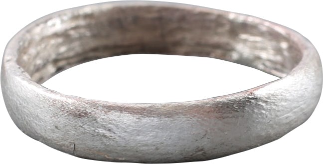 EUROPEAN CHILD’S RING C1350-1450 SIZE 5 1/4: Silvered bronze, size 5 1/4 with low rounded face, 3.6mm width. Made with a central core to distribute the molten metal and heat. The core was then laboriously removed by hand with the remnants still