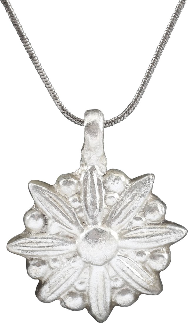 ROMAN WHEEL OF FORTUNE AMULET NECKLACE, 5TH-8TH CENTURY AD: Late Roman/Byzantine period, 5th-8th century AD. The concept of the Rota Fortunae, the Wheel of Fortune, dates back millennia with the Roman goddess Fortunae capriciously deciding the fate of men with