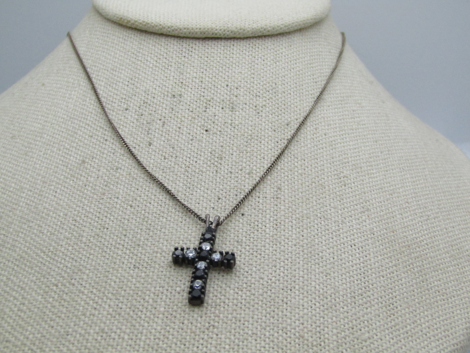 Vintage Sterling Black & Clear Rhinestone Cross, 19", Avon , 1980's: Vintage Sterling Black & Clear Rhinestone Cross, 19", Avon , 19". The cross is appx 1-1/8" tall and 3/4" wide. It is marked .925 and signed Avon and also with initials BS The chain is marked