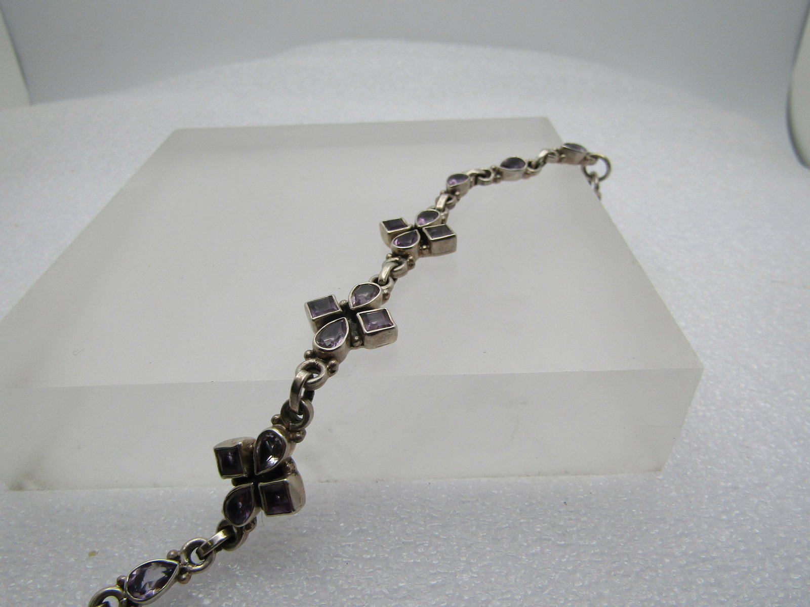 Vintage Amethyst Bracelet - Bezel-Set Stones, 7.5" , 1980's-1990's: Vintage Amethyst Bracelet - Bezel-Set Stones, 7.5" , 1980's-1990'sIt has three wider sections that have two swaure and two pear-shapled bezel-set stones - each of those sections is appx. 5/8" wide