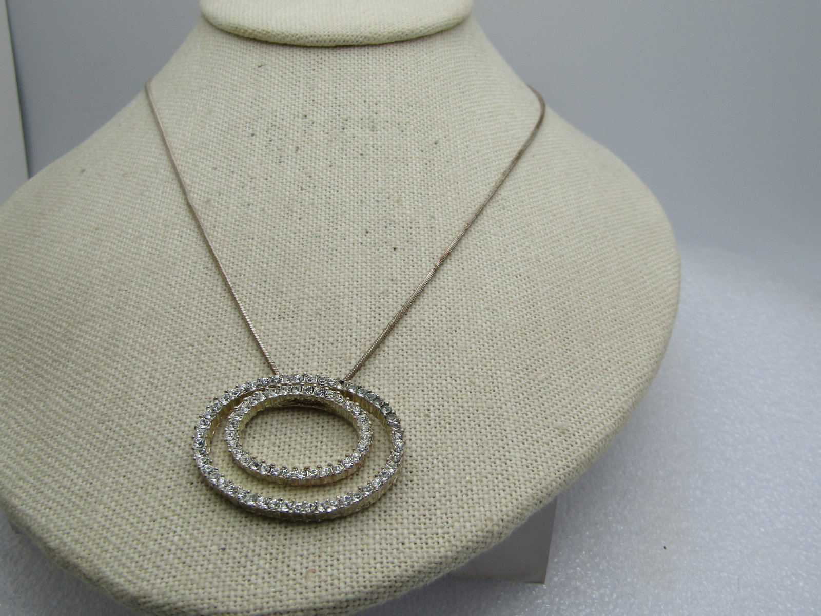 Vintage Double Oval Slide Necklace, CZ/Rhinestone, Signed Premier Design, 18"-21", 1980's: Vintage Double Oval Slide Necklace, CZ/Rhinestone, Signed Premier Design, 18"-21". 1980's-1990's. Silver tone with a 1mm snake chain that is 18" with an additional 3" extender chain. The pendant