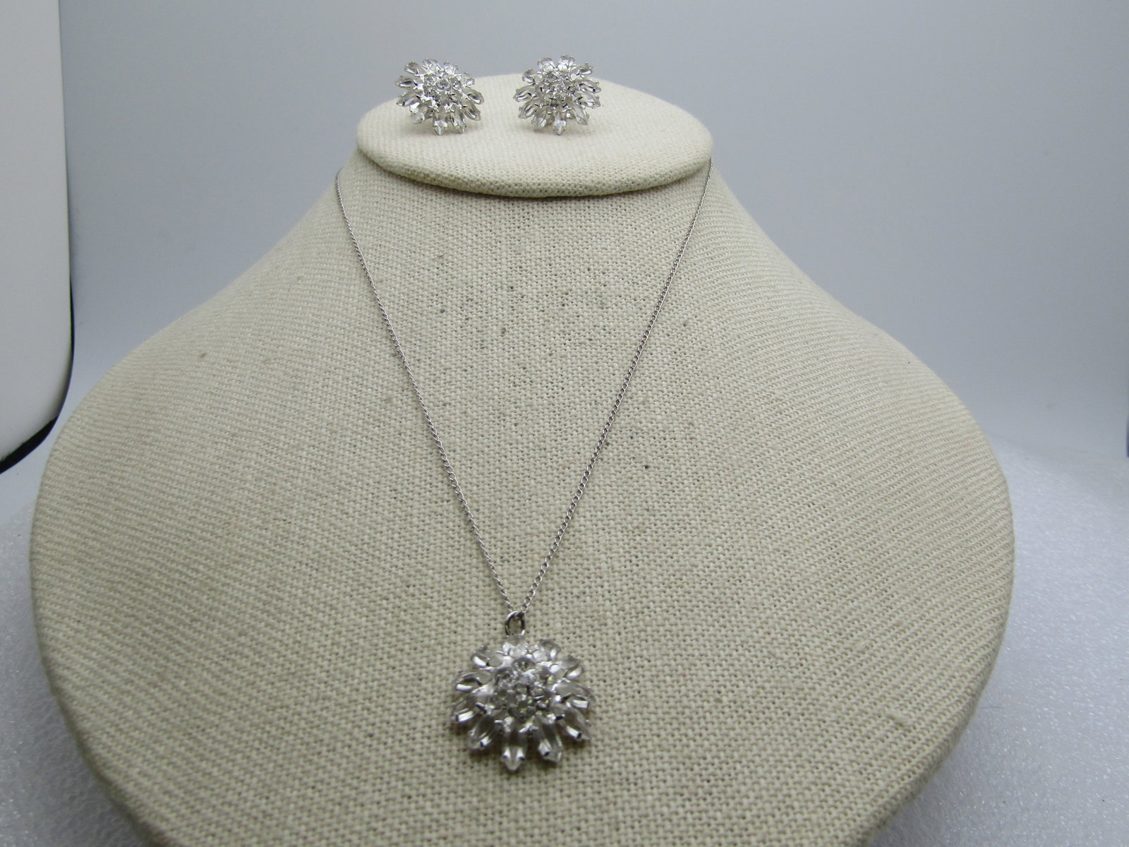 Vintage Rhinestone Blossom Necklace & Earrings, Screwback, Marked Sterling 1980's-1990's Signed: Vintage Rhinestone Blossom Necklace & Earrings, Screwback, 1980's-1990's Signed C and a triangle. The necklace is 16" long with a 3/4" round domed blossom rhinestone pendant. The earrings are the