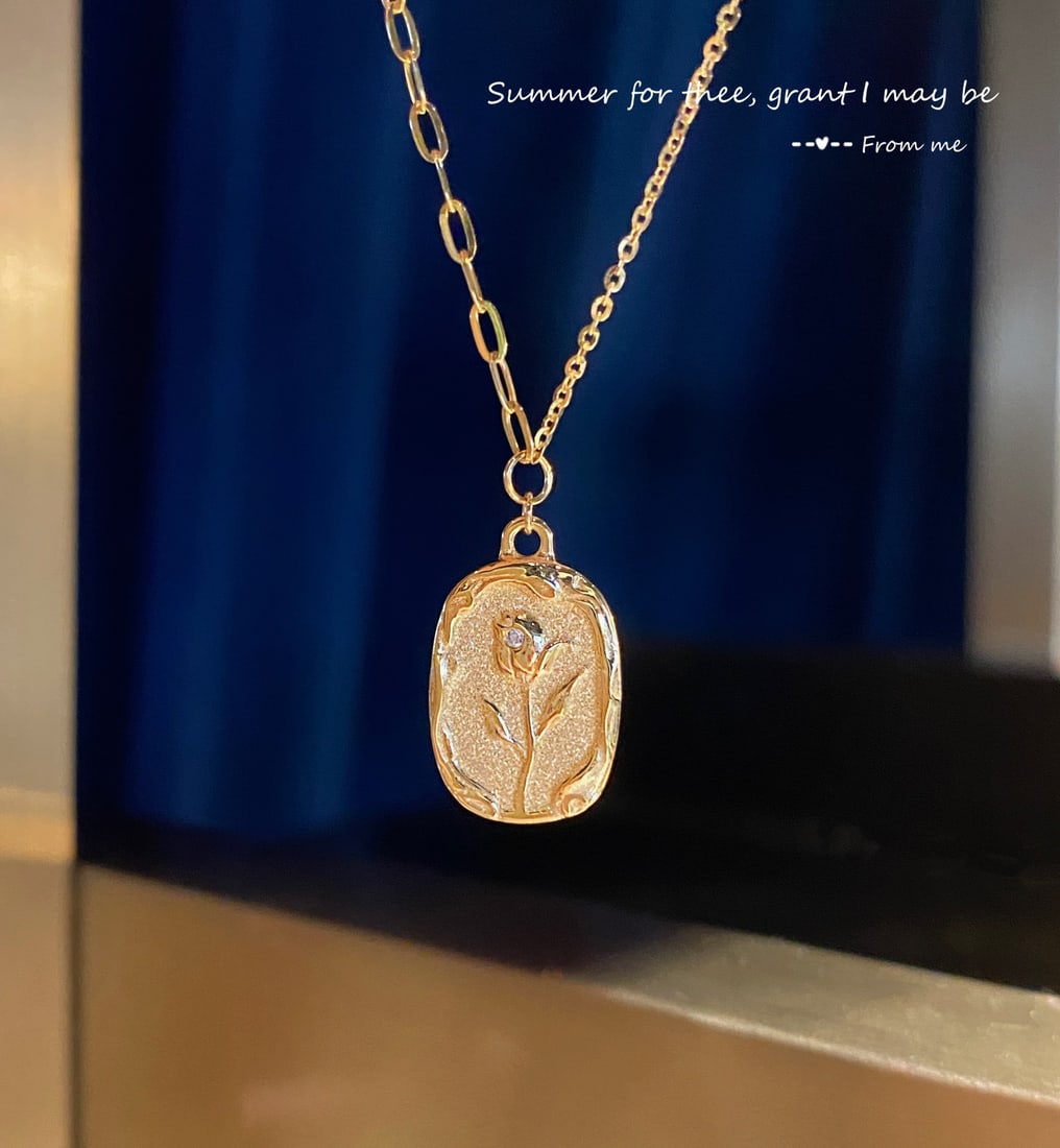 18K Gold Diamond Tulip Necklace: Title: 18K Gold Diamond Tulip Necklace Description: This necklace captures the eternal romance of tulips, symbolizing love that never fades. More than just roses, tulips instantly captivate with