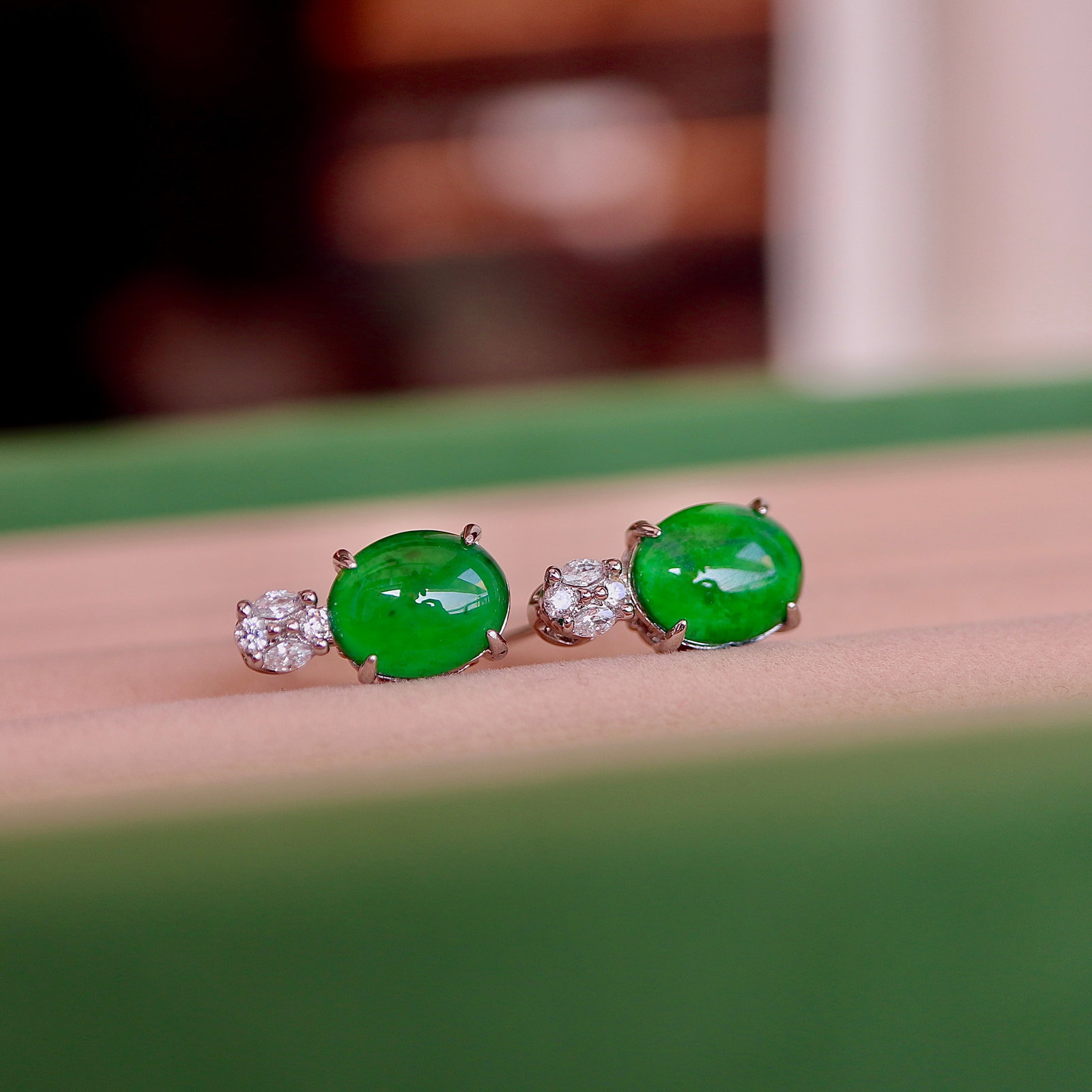 Natural Jade Earrings: Title: Natural Jade Earrings Description: These earrings showcase the timeless elegance of natural jade, carefully sculpted into an oval shape to capture the essence of simplicity and elegance. Each p