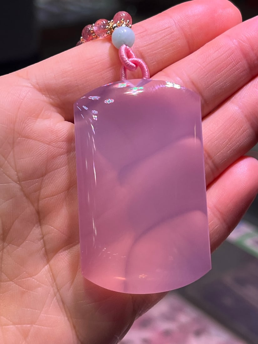 Natural crystal pendant: Title: Natural crystal pendant Description: This pendant is stunning with its super beautiful color and the crystal's pure clarity. Carefully carved from natural crystal, it perfectly blends elegance