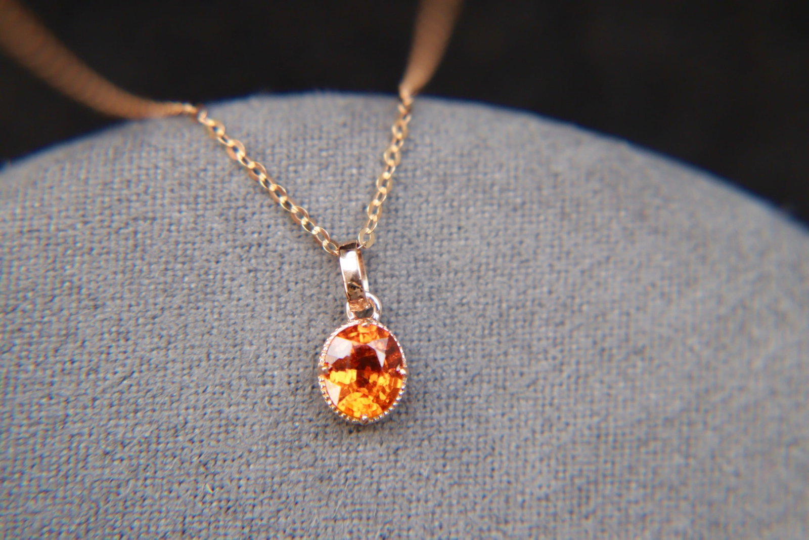 18K Gold Natural Fanta Garnet Pendant: Title: 18K Gold Natural Fanta Garnet Pendant Description: This pendant showcases the vibrant charm of natural Fanta gemstone, set in exquisite 18K gold. Its vivid hues and remarkable clarity make it