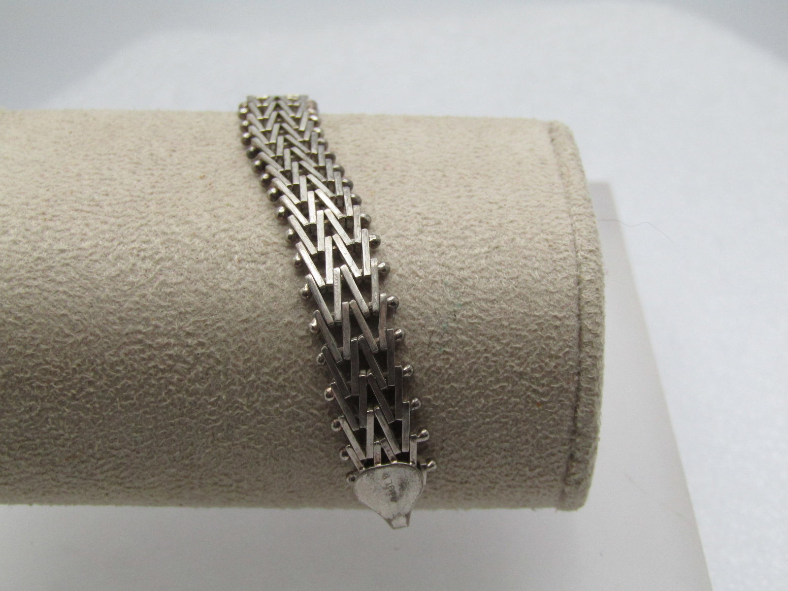 Vintage Sterling Woven Link Bracelet, 7". 9mm, Italy, 1980's-1990's: Vintage Sterling Woven Link Bracelet, 7". 9mm, Italy, 1980's-1990's. Spring clasp is not sterling. The bracelet tests as sterling and is marked. It has smooth and textured finish links that have a