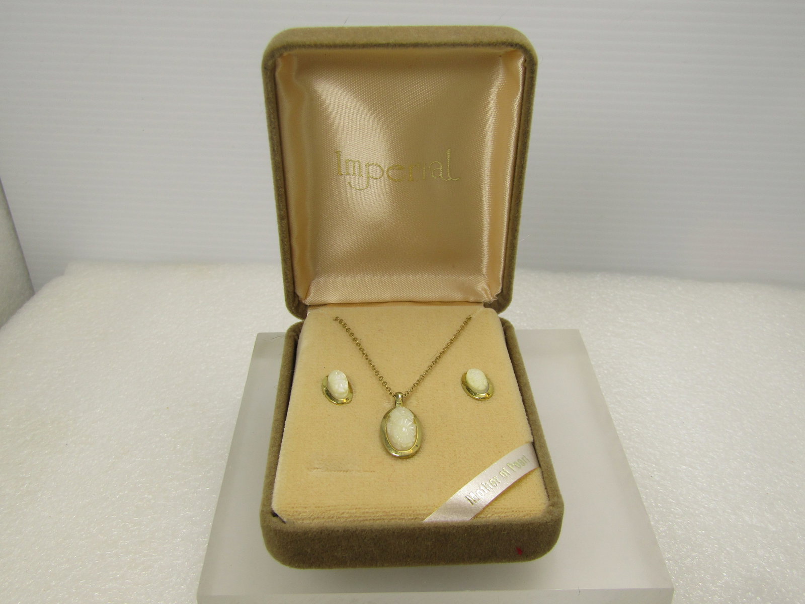 Vintage Carved Floral Cameo Necklace & Earrings, Imperial, 4kt GF Original Box, 1960's: Carved Floral Cameo Necklace & Earrings, 14kt GF and Sterling Plated, Original Box, 1960's. The pendant and earrings are sterling silver and gold plated with the chain being 1/20 14kt Gold Filled. 