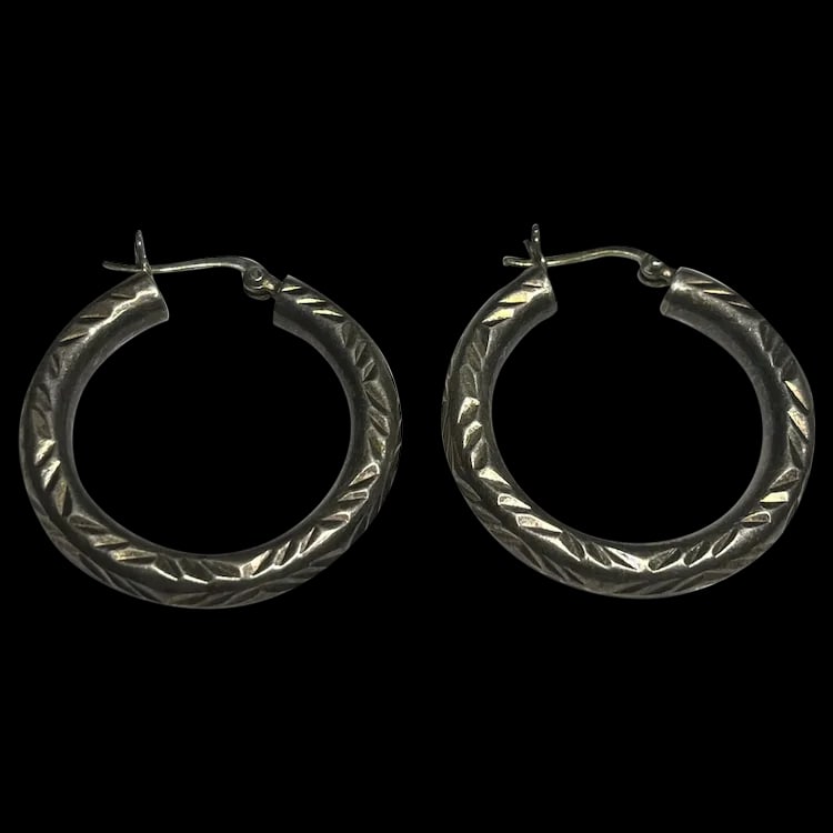 Vintage Etched Sterling Silver Hoop Earrings: Title: Vintage Etched Sterling Silver Hoop Earrings Description: Vintage Etched Sterling Silver Hoop EarringsSterling SilverWeighs 4.9 gramsApprox. 1.25 inch circumference Date/Period: Vintage