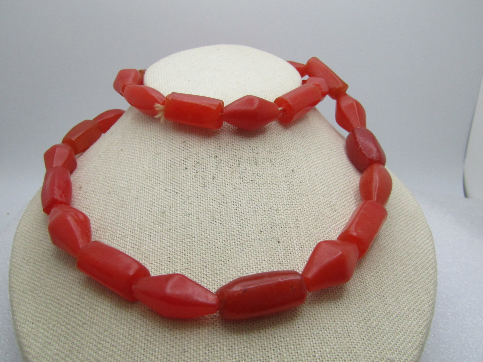Vintage 30" Coral Plastic Beaded Necklace, 1940's-1950's: Vintage 30" Coral Plastic Beaded Necklace, 1940's-1950's. These do not test as bakelite. They are a rustic bead. There are appx. 1" long beads that have rough edging on them that looks like they are m