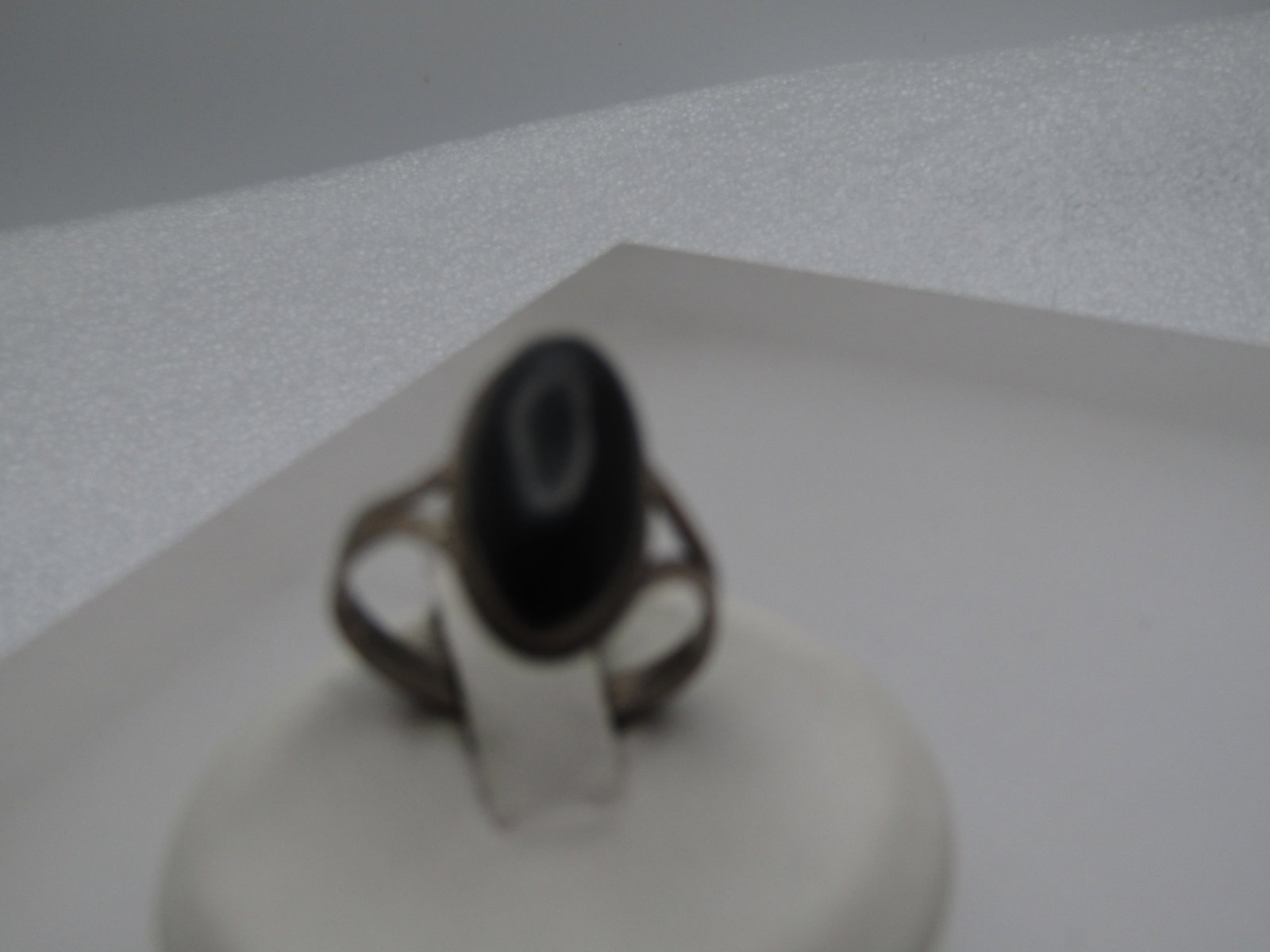 Vintage Sterling Jet Southwestern Ring, Sz. 7.25, 1960's-1970's: Vintage Sterling Jet Southwestern Ring, Sz. 7.25, 1960's-1970's. This has an elongated oval bezel-set black stone that is lightweight and apepars to be jet. It is appx. 15mm by 7.5mm with a slightly w