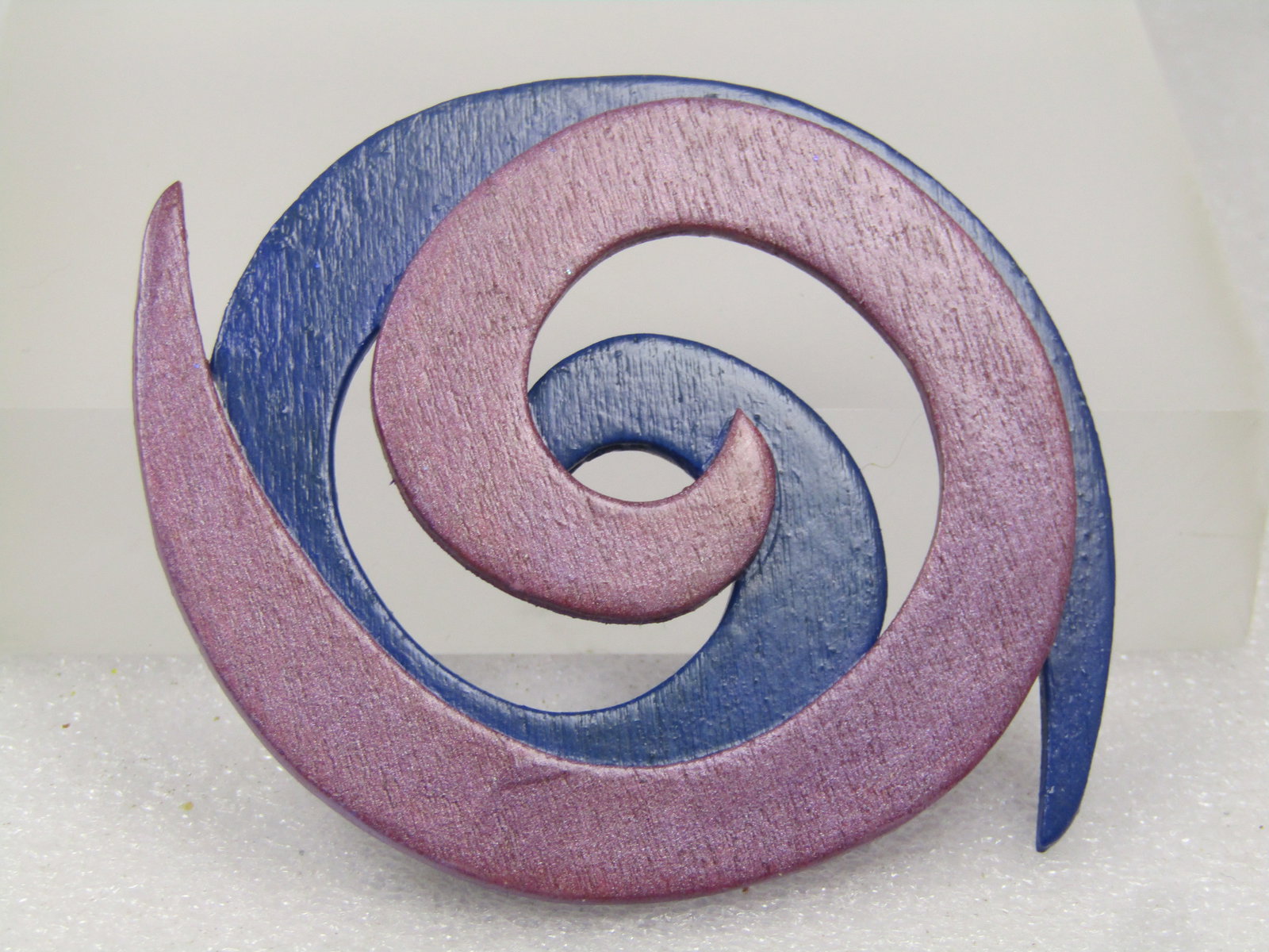 Vintage Blue/Lavender Sprial Brooch, Wooden, Handmade, 3.25": Vintage Blue/Lavender Sprial Brooch, Wooden, Handmade, 3.25" from widest piont to widest point. Two stacked spirals in navy and lavender with their pionted ends extending outward and open areas