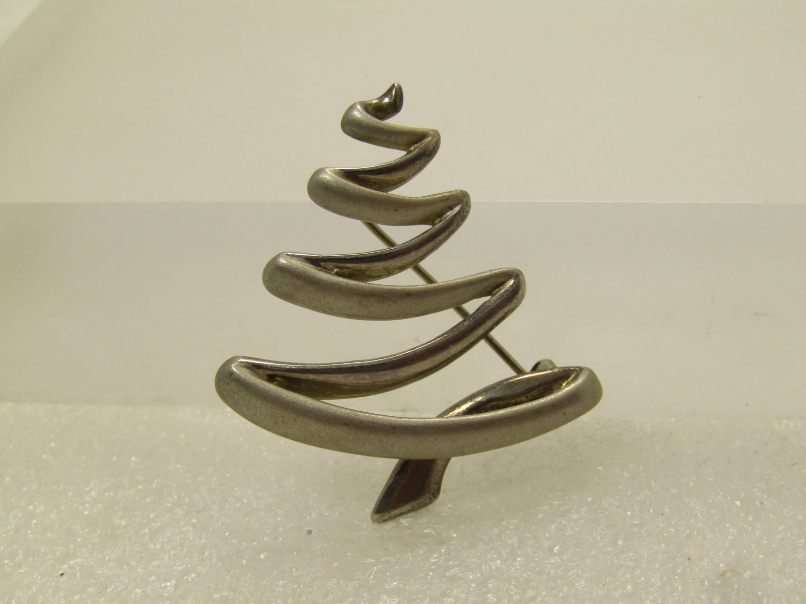 Vintage Sterling Zig Zag Tree Brooch, Signed B.A.B., 1980's: Vintage Sterling Zig ZagTree Brooch, Signed B.A.B., 1980's. (BAB is Ba Ballou). This is a scribble style Christmas tree or just tree. It has alternating smooth lines with satiny lines that are