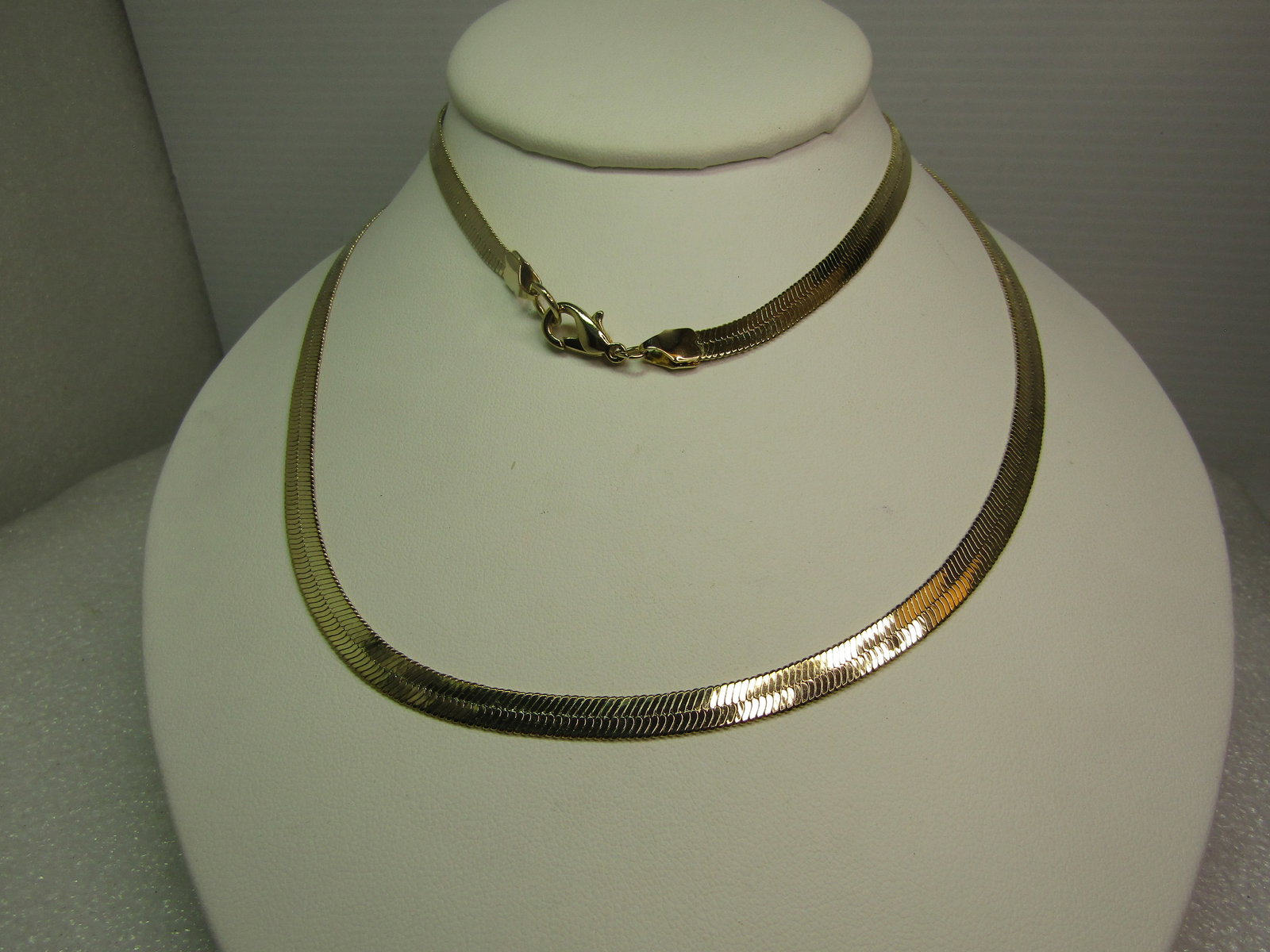 Vintage Gold Tone Herringbone 30" Necklace, 5mm, 1980's-1990's: Vintage Gold Tone Herringbone 30" Necklace, 1980's-1990's. Great to wear just as the chain or to slide a pendant on to it. Unsex with the 30" length and 5mm width. It is very clean and in very