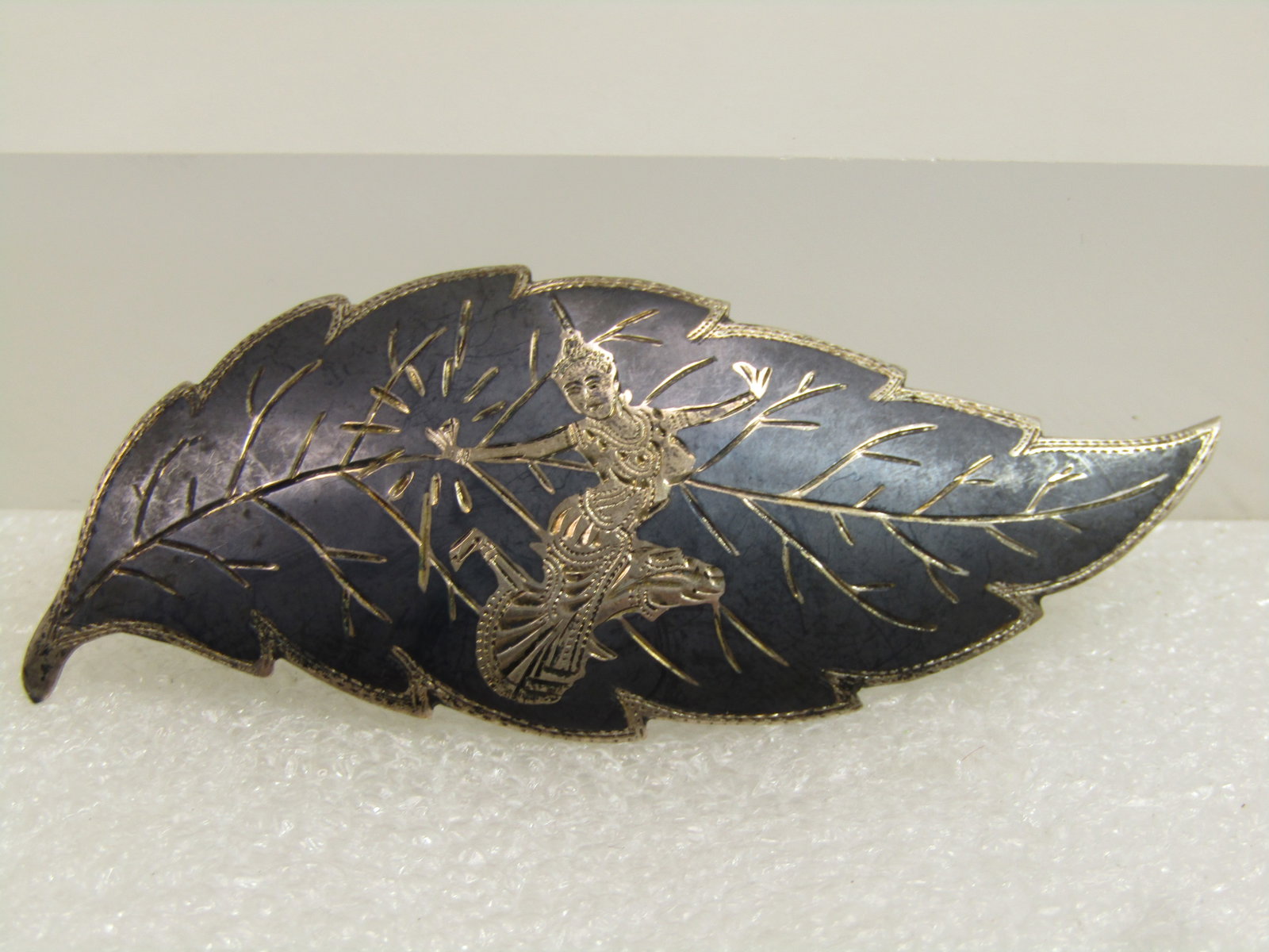 Vintage Sterling Enameled Siam Goddess Brooch, Leaf, Mid-Century: Vintage Sterling Enameled Siam Goddess Brooch, Leaf, Mid-Century. 1940's-1950's. It is marked sterling and tests as sterling with an appx. weight of 9.16 grams. It is appx. 2.5" long and 1" wide. 