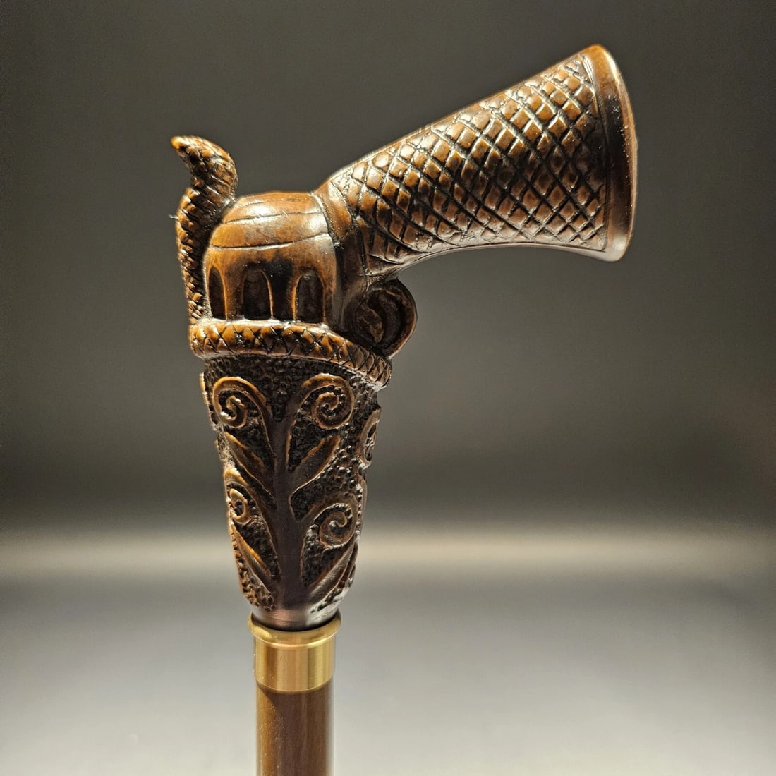 Wood Walking Cane With Gun Handle: Title: Antique Style Wood Walking Cane Description: This reproduction Italian cane features a firearm handle made of strong cellulose acetate from Italy. It's attached to a sturdy 3/4" beech wood shaf
