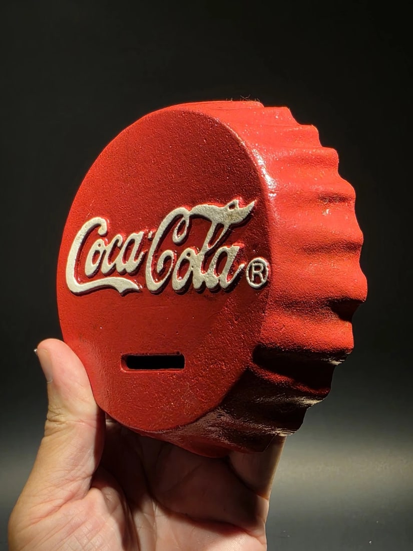 Cast Iron Coca Cola Bottle Cap Coin Bank Atlanta Ga.: Title: Antique Vintage Style Cast Iron Coca Cola Bottle Cap Coin Bank Atlanta Ga. Description: 5 1/4" Wide Nice reproduction cast iron coca cola bottle cap coin bank. Slightly aged to look old. hard t